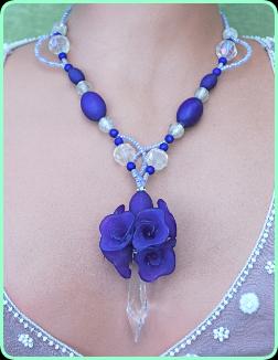 Purple designer necklace, long drop with large chandelier piece with purple flower drop
